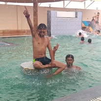 Buchchi and Manoj (Gaji) Posing in the waterpark Baseth
